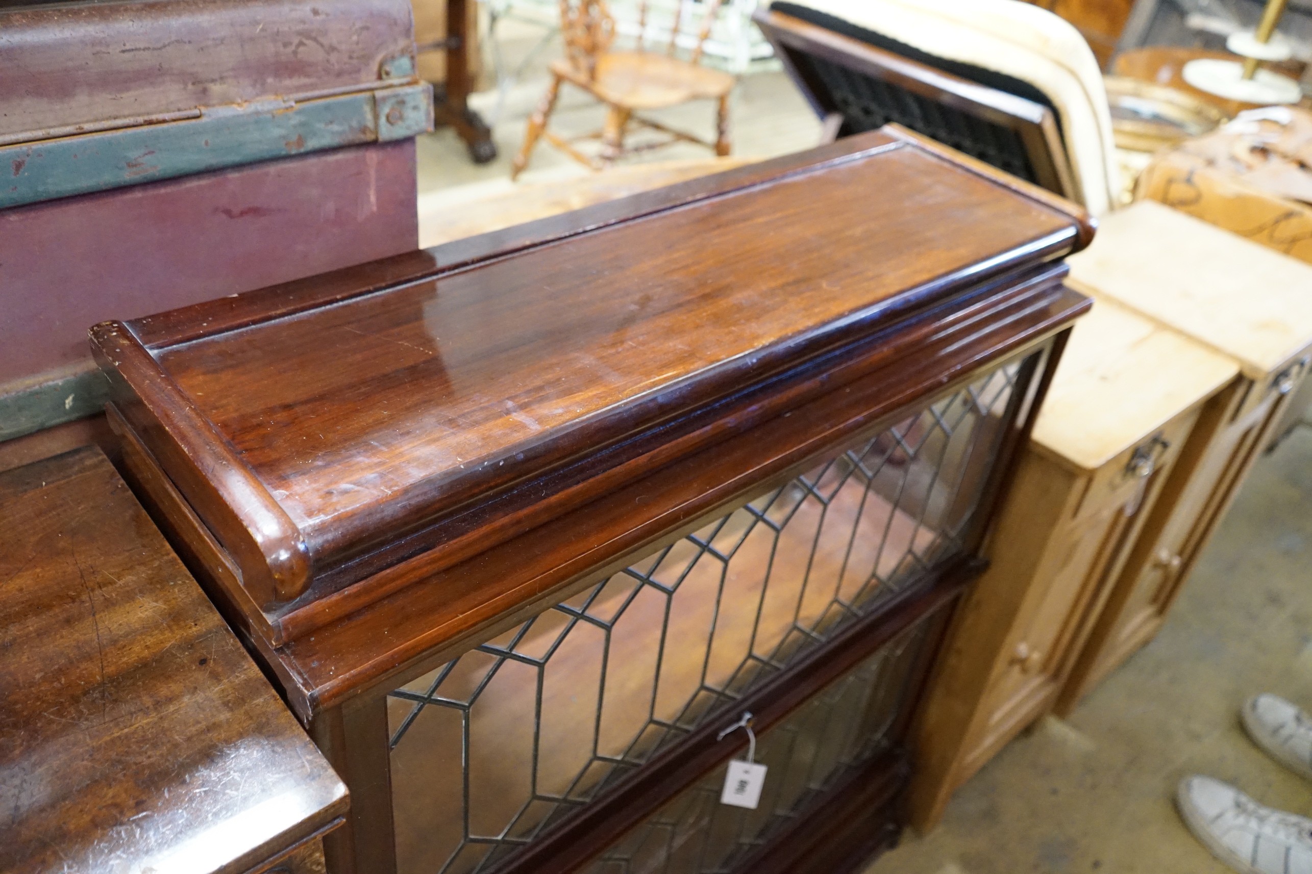 A Globe Wernicke type mahogany two section bookcase (lacks back panels), width 87cm, depth 29cm, height 100cm